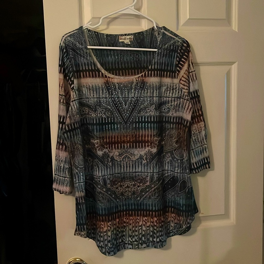 World Unity XL multi colored top. It has rhinestones on the front. So cute.